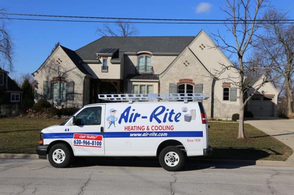 Air-Rite Heating & Cooling service van parked outside a Chicagoland home